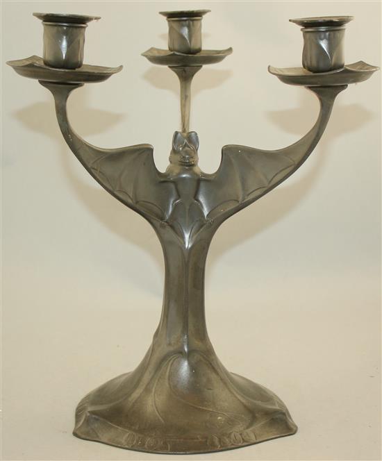 Hugo Levin. A Kayserzinn pewter three branch bat candelabrum, 12.5in.